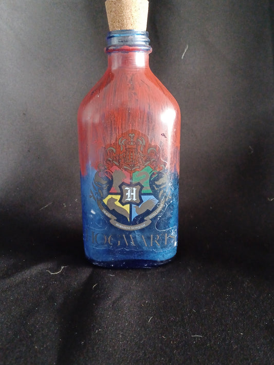 Hand painted bottle w/ Hogwarts logo & fairy lights