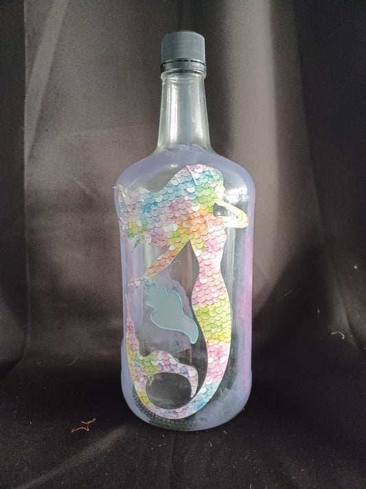 Hand painted Lg glass bottle w/ mermaid and sea shell. w/ fairy lights