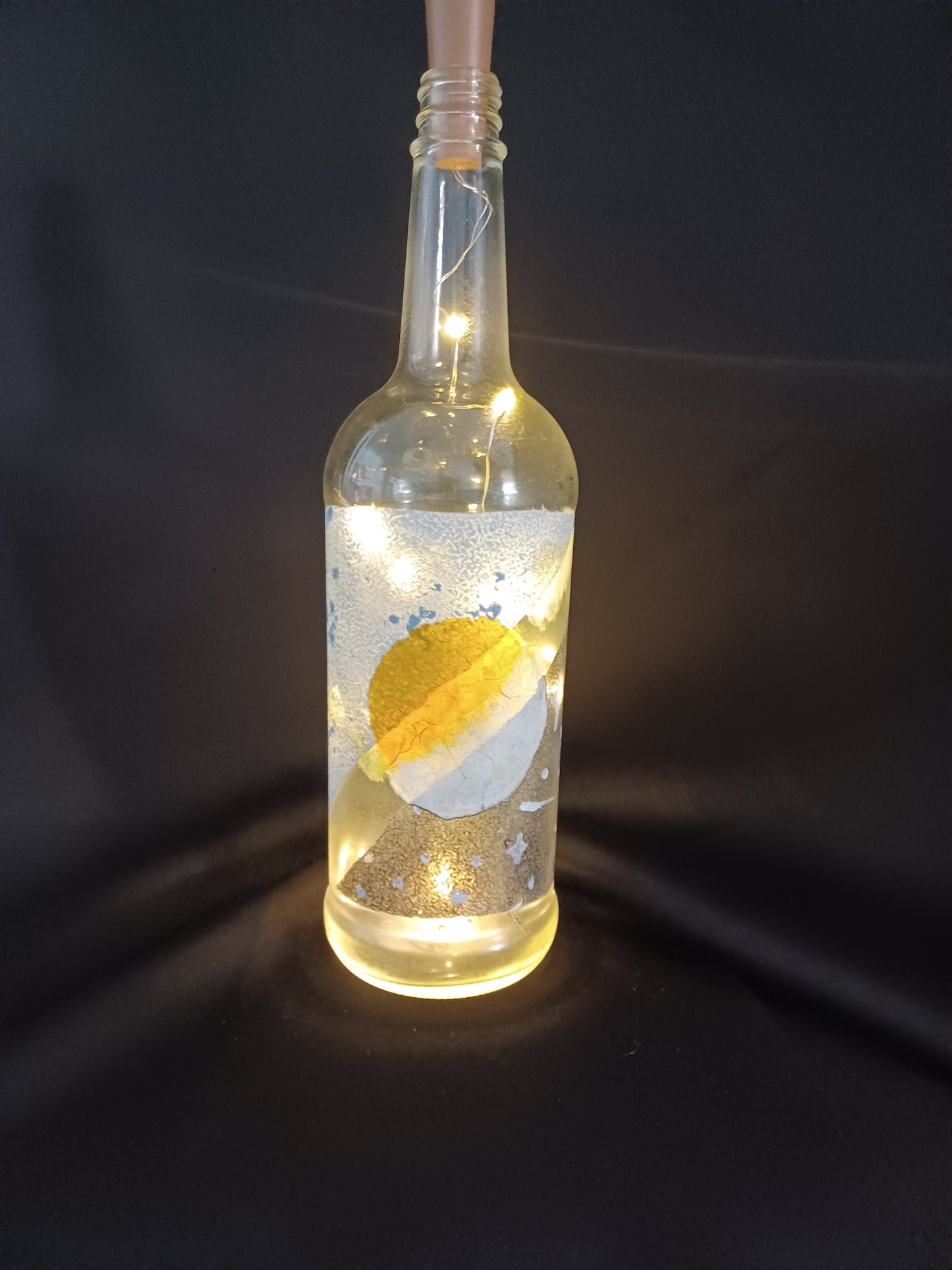 Hand painted bottle w/ sun & stars, fairy lights