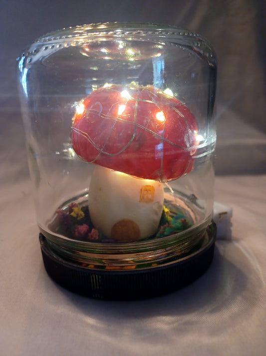 Handmade mushroom house night light in a jar