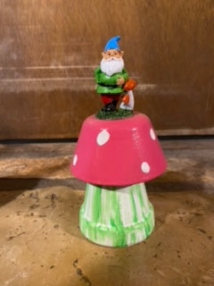 Gnome on a pink mushroom