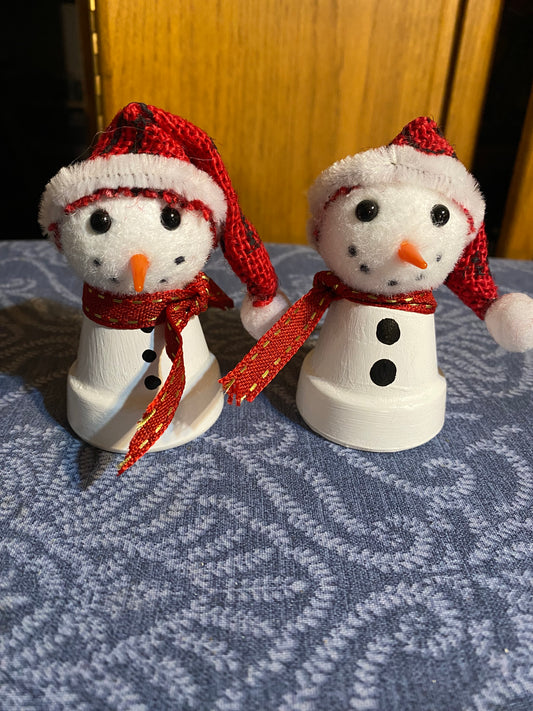 tiny santa hat snowman