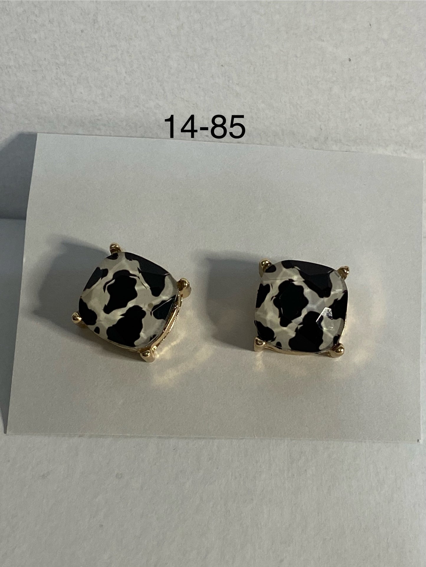 black cow print cushion cut postback earrings